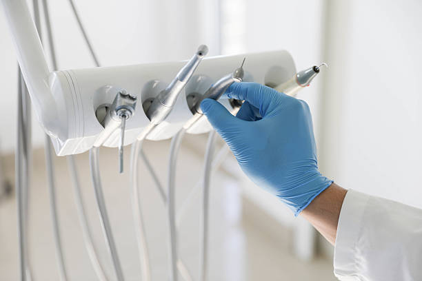 Professional Emergency Dentist technician working in Biloxi, MS